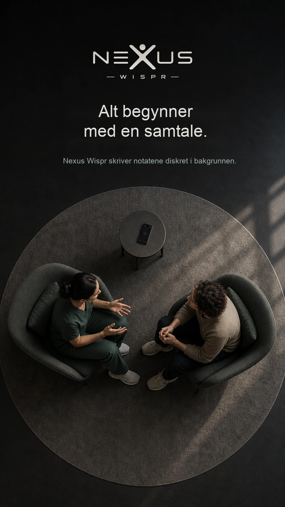 En konsultasjon sett ovenfra, med en telefon som tar opp på det lille bordet.