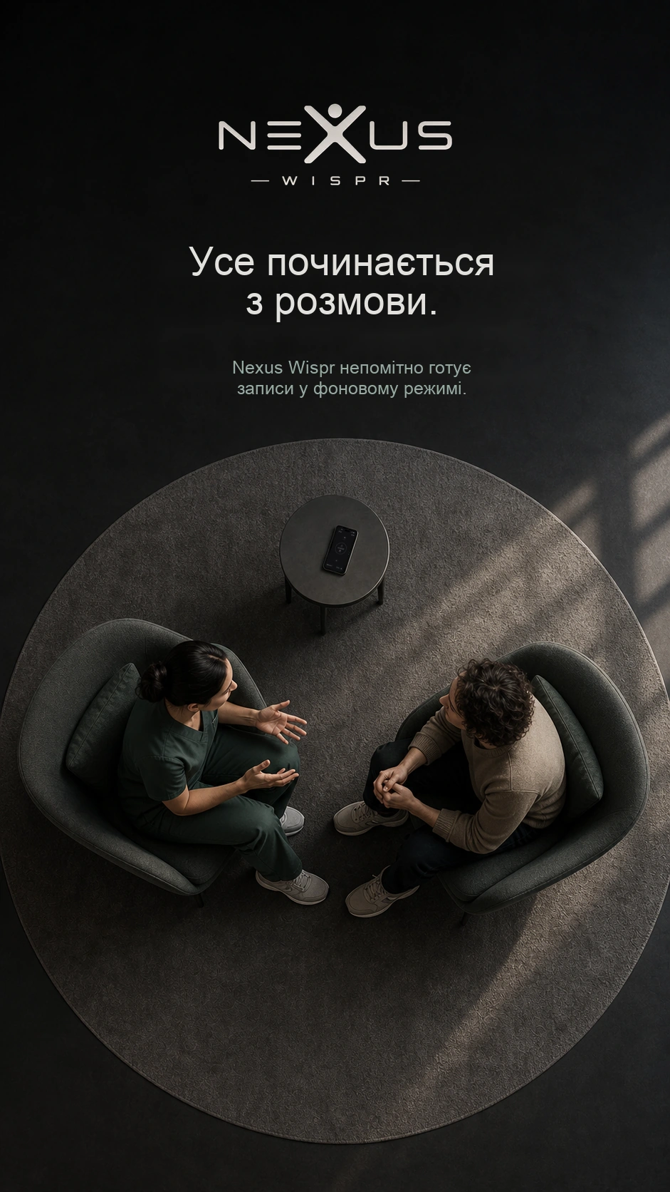 Вигляд згори на консультацію й телефон, що записує на маленькому столі.
